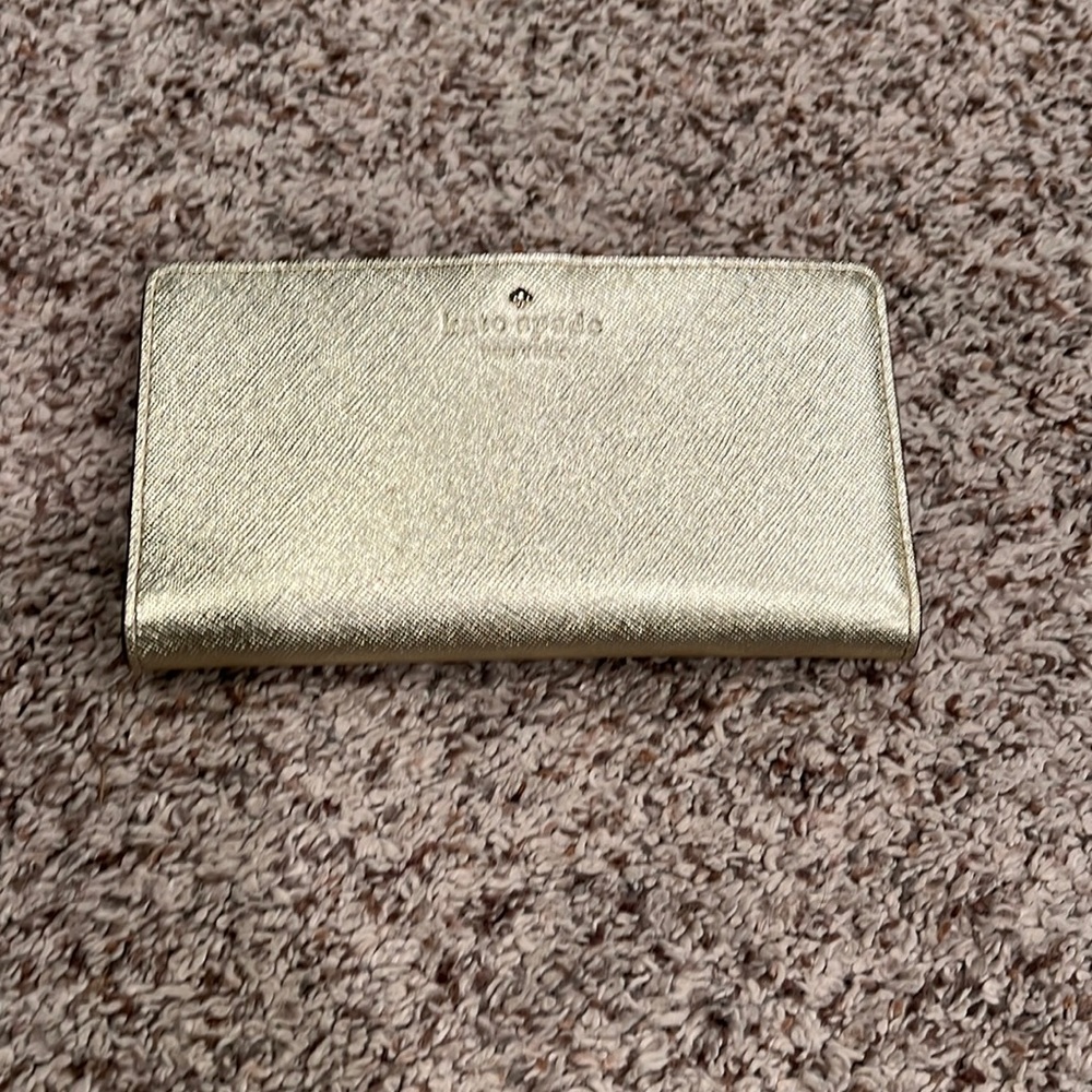 Kate Spade Gold wallet. never used.